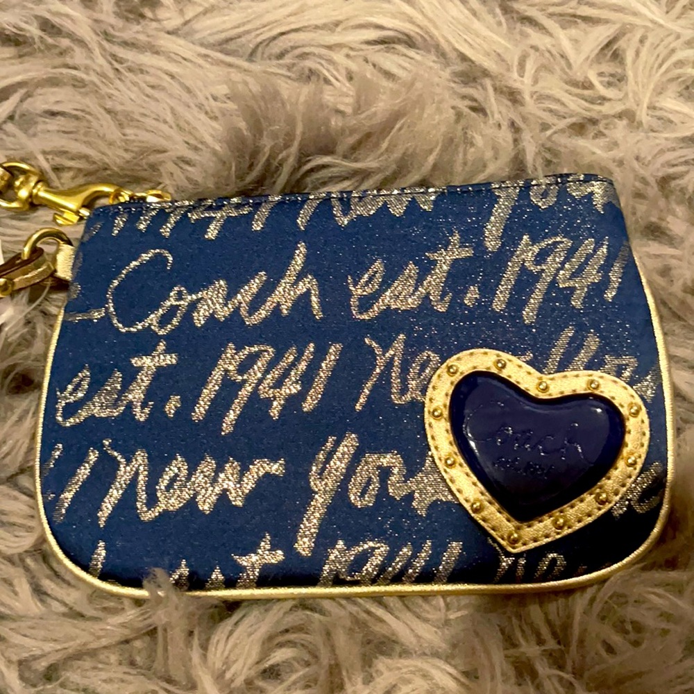Navy and gold Coach wristlet